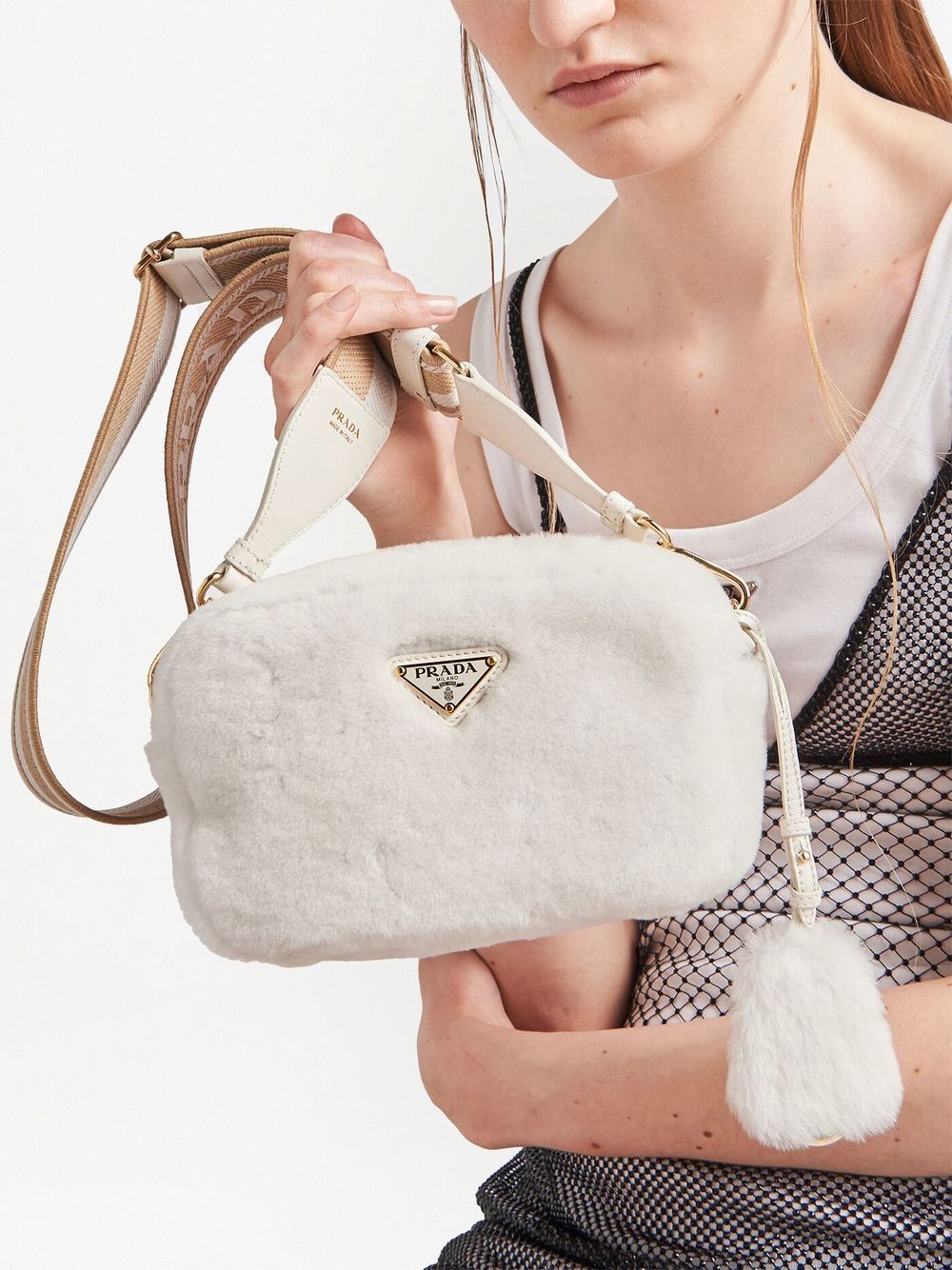 Pra*a triangle-plaque shearling shoulder bag